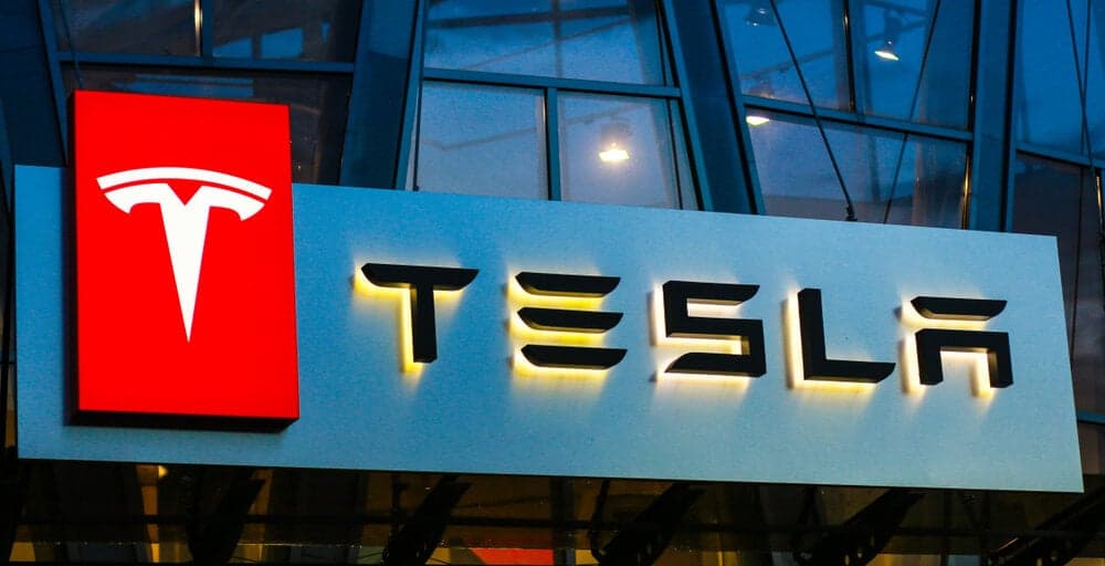 Tesla shares rose 8% in after-market trading as Bitcoin Holdings topped $1 billion.