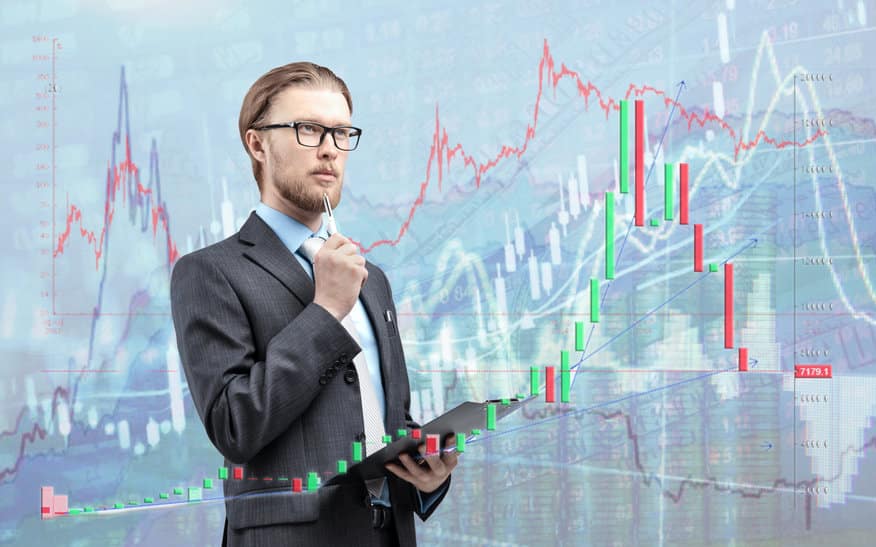 Businessman Trader Analyst In Glasses Spectacles With Notebook And Thinking, On Diagram Background. Trading On Stock Exchange Concept